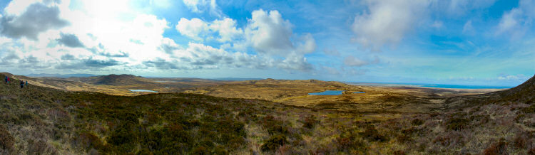 Picture of a panoramic view over two sea lochs cutting into an island