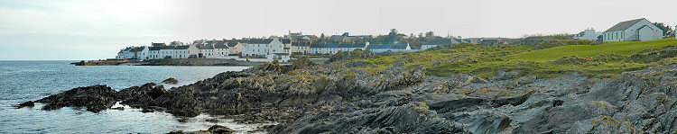 Picture of a panoramic view over a village at the sea