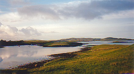 Picture of a loch in the evening sun on a calm evening