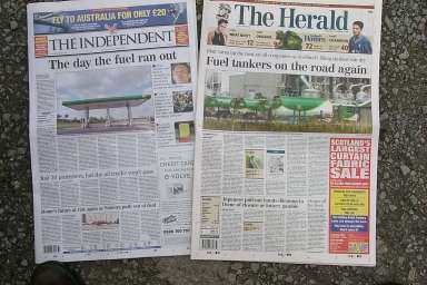 Picture of two newspapers with front page coverage of the fuel crisis