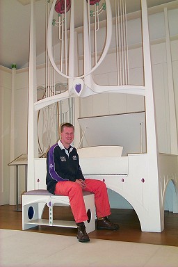Picture of Armin in front of the piano at the House for an Artlover