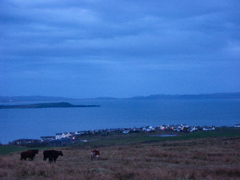 Picture of the view over Port Charlotte from Octomore Hill in the dusk