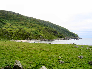 Picture of a bay at the bottom of the cliffs