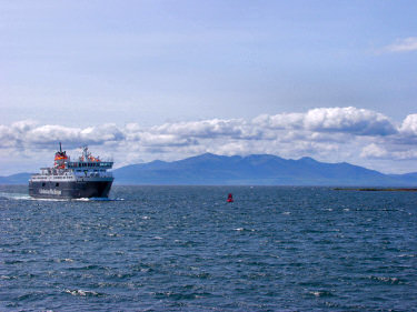 Picture of the ferry arriving in Ardrossan with Arran in the background