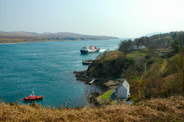 Picture of a view over Freeport towards Port Askaig with the ferry arriving