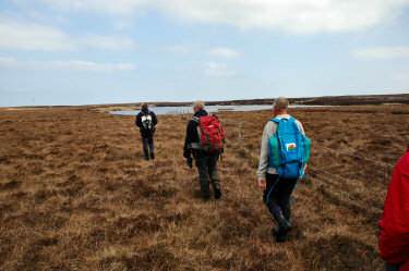 Picture of walkers approaching Loch an Fhir Mhór