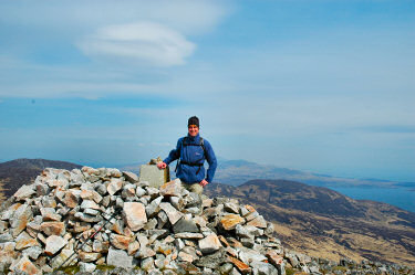 Picture of Armin at the trig point on Beinn Bheigier