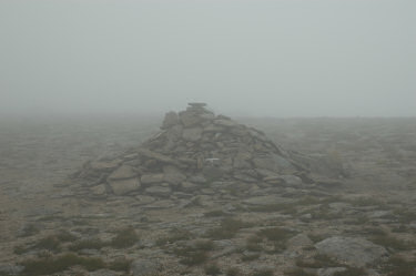 Picture of a cairn in the low clouds