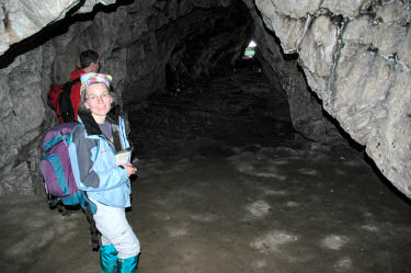 Picture of people inside a large cave