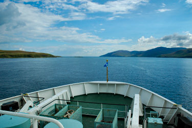 Picture of the view over the bow of a ship down the Sound of Islay
