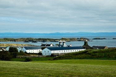 Picture of a distillery (Ardbeg) in the late afternoon sun