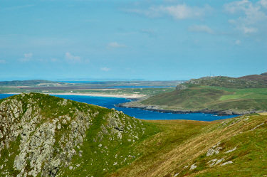 Picture of a view from a hill over two bays (Machir Bay and Kilchiaran Bay on Islay)