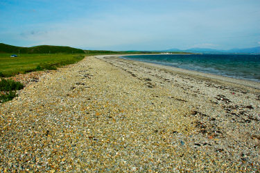 Picture of a pebble beach next to a raised beach