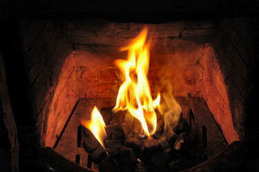 Picture of an open fire in a fireplace