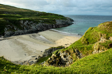 Picture of a view over a small bay with a sandy beach