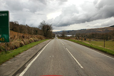 Picture of road leading out towards a sea loch in the distance