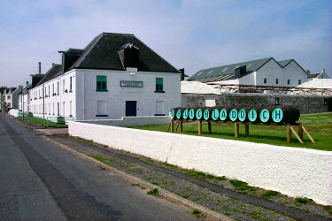 Picture of Bruichladdich distillery with the name painted on whisky casks