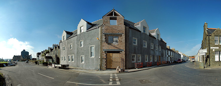 Panorama picture of a building site for a hotel, the scaffolding has finally been removed