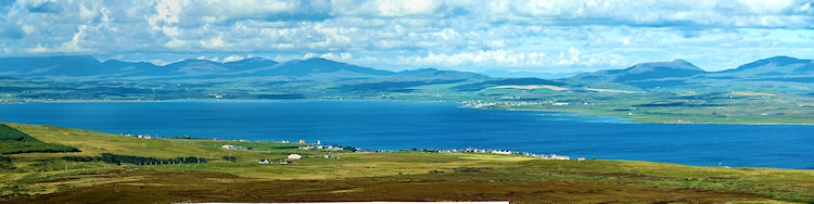 Picture of a panoramic view over sea loch with two coastal village