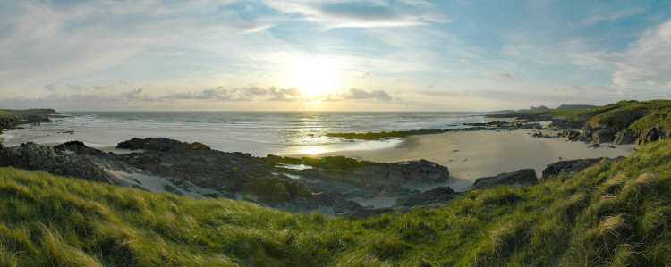 Picture of a panoramic view over a bay in the evening light