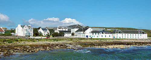 Picture of a house and a distillery building